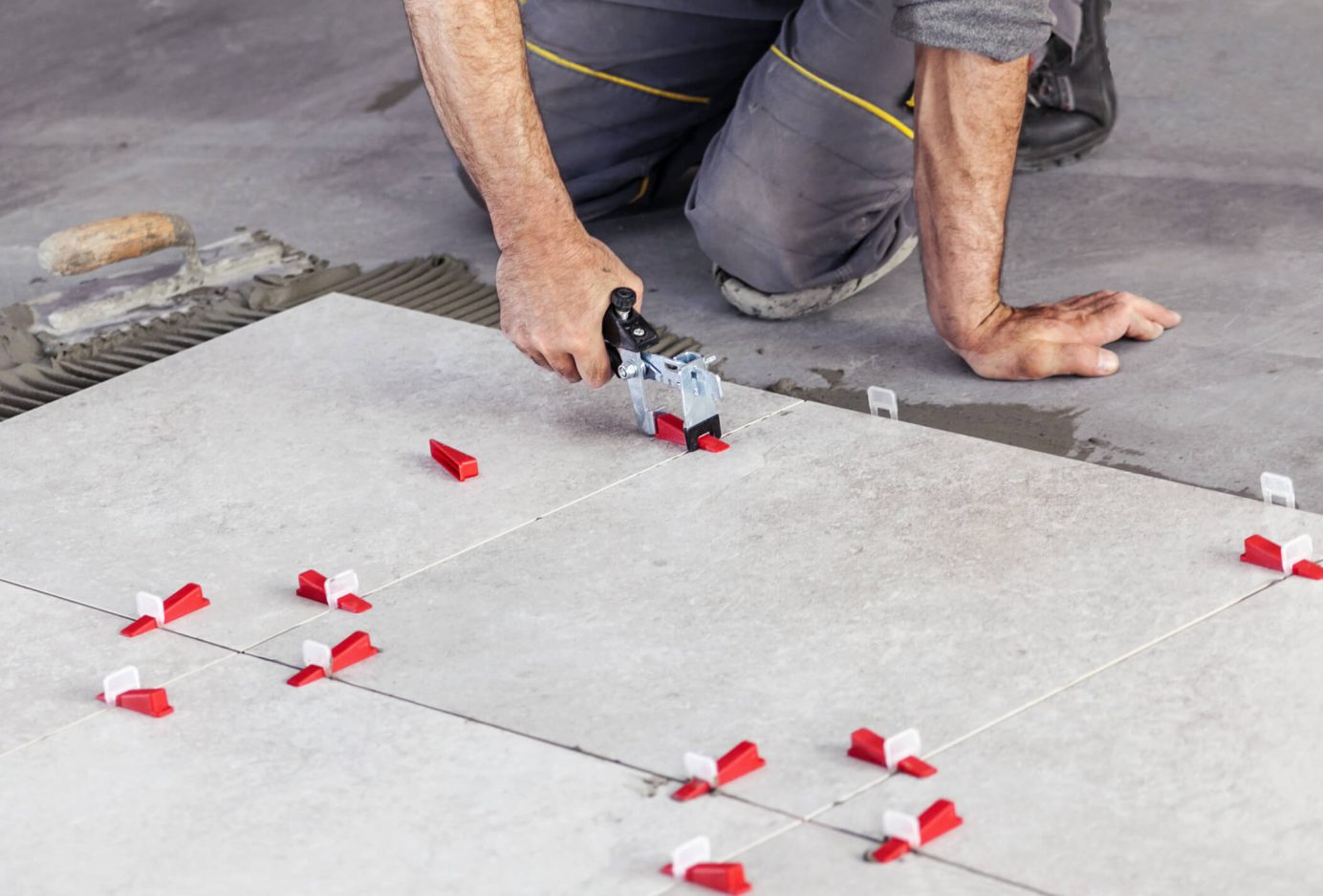 Professional tiler working